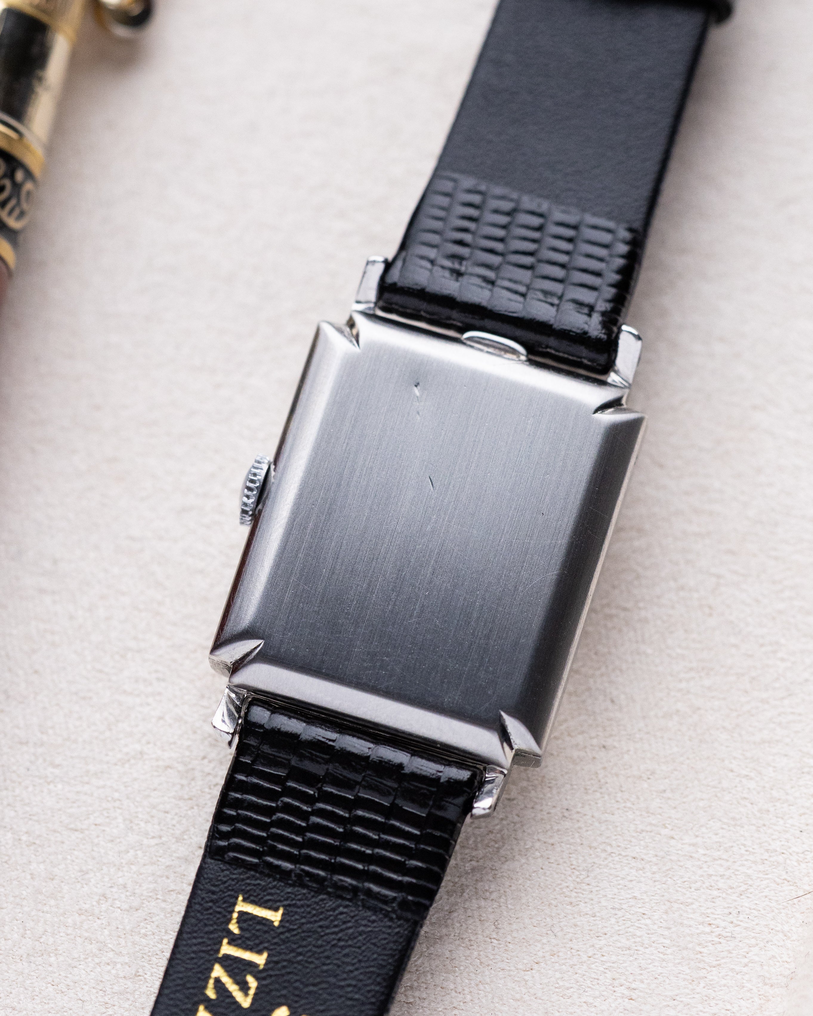 Omega Vintage Art Deco Tank, Black Gilt Dial, Roman Numerals from 1940 - DuMarko