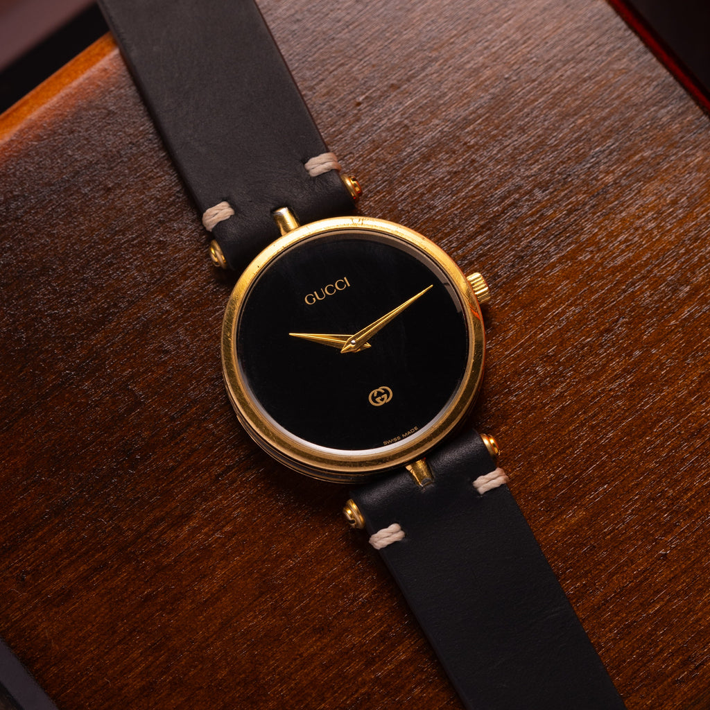 Vintage GUCCI Black and Gold Watch - VintageDuMarko